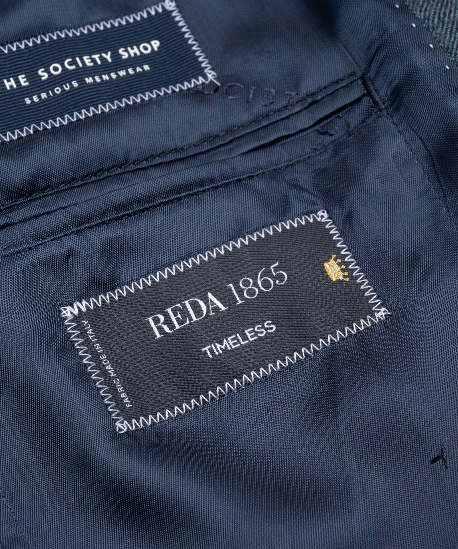 Colbert S110's wol Reda Timeless blauw visgraat