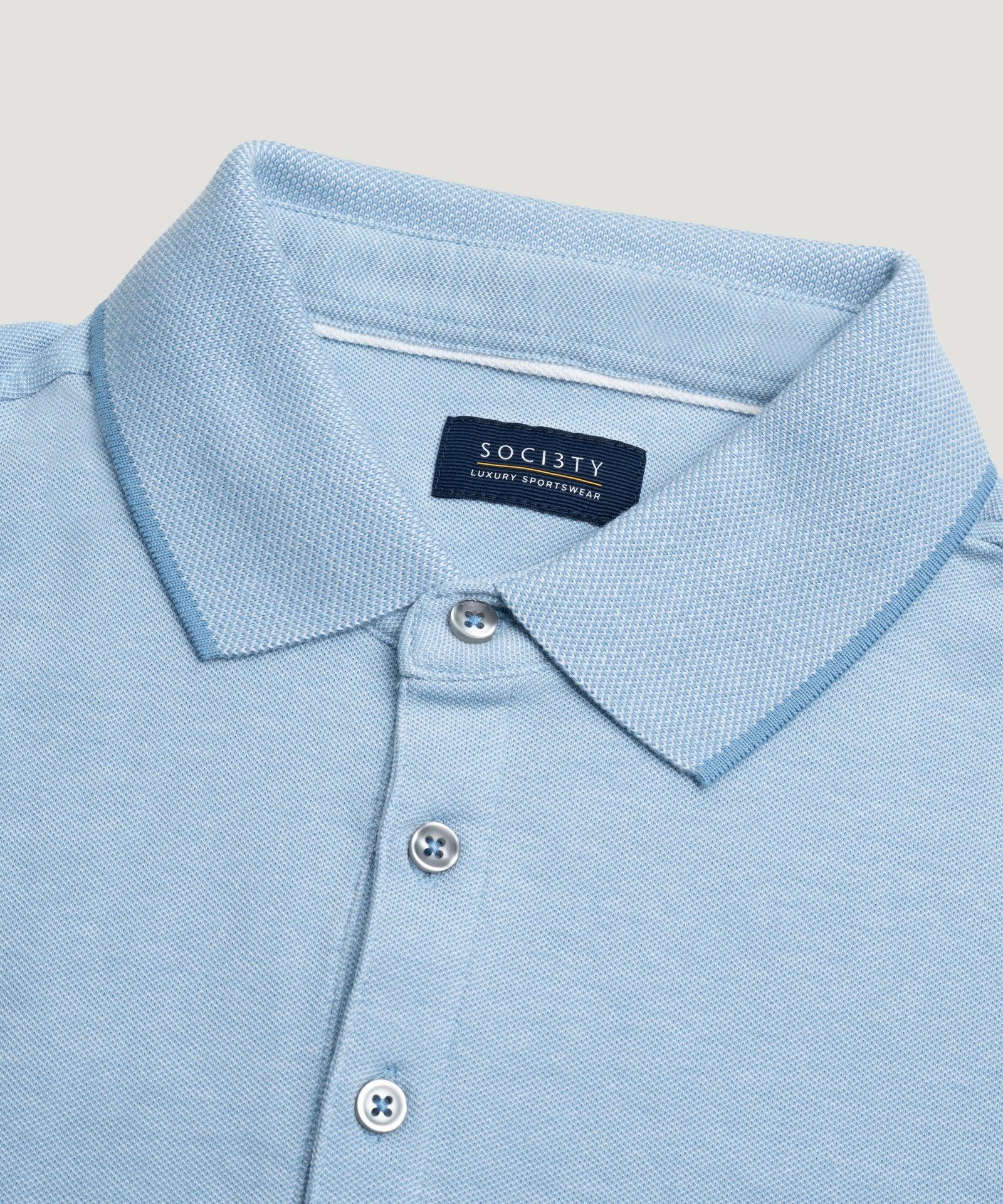 SOCI3TY Luxury Sportswear Polo piqué stretch lichtblauw - THE SOCIETY SHOP
