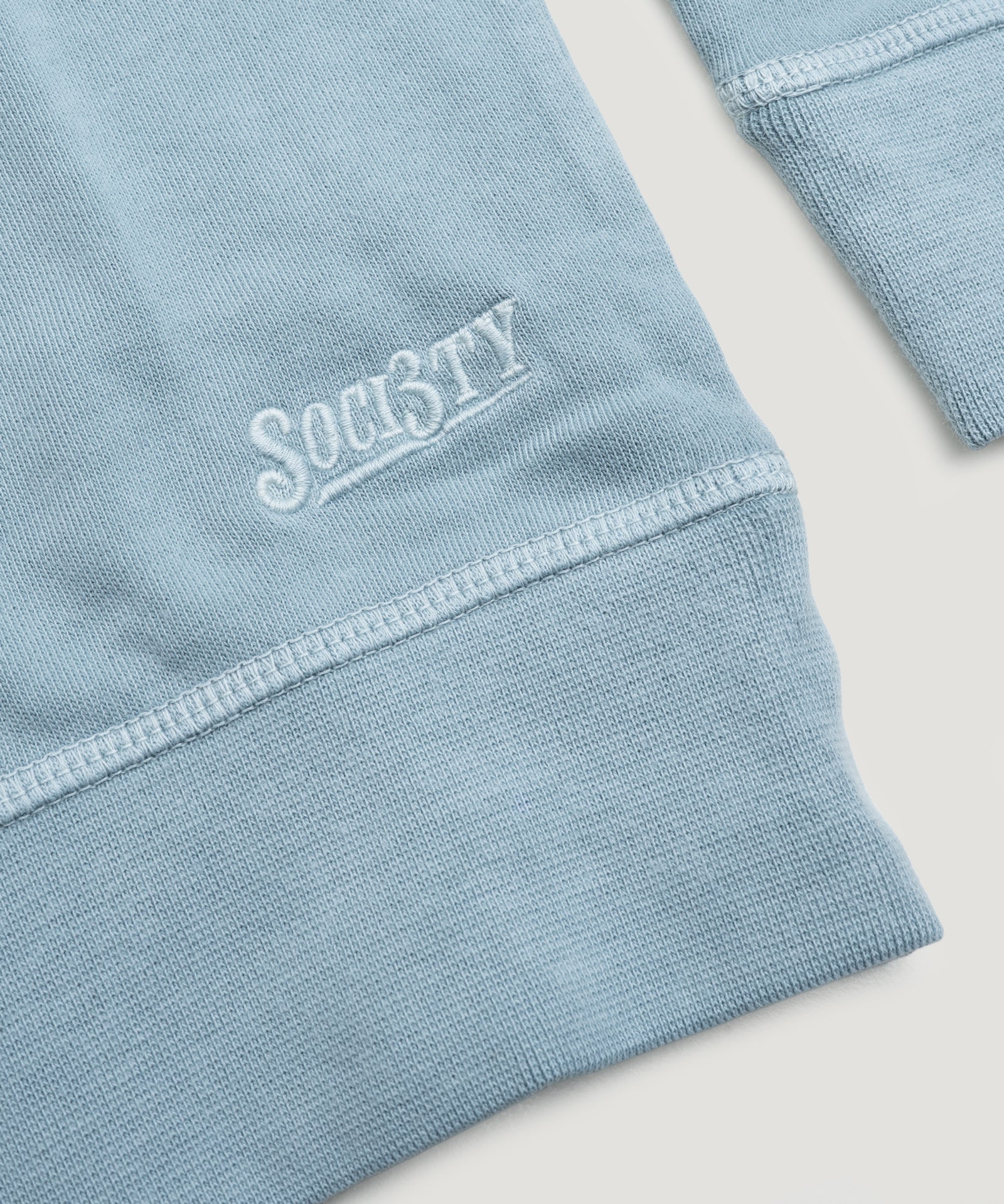 SOCI3TY Luxury Sportswear Jersey sweatshirt garment - dyed katoen lichtblauw - THE SOCIETY SHOP