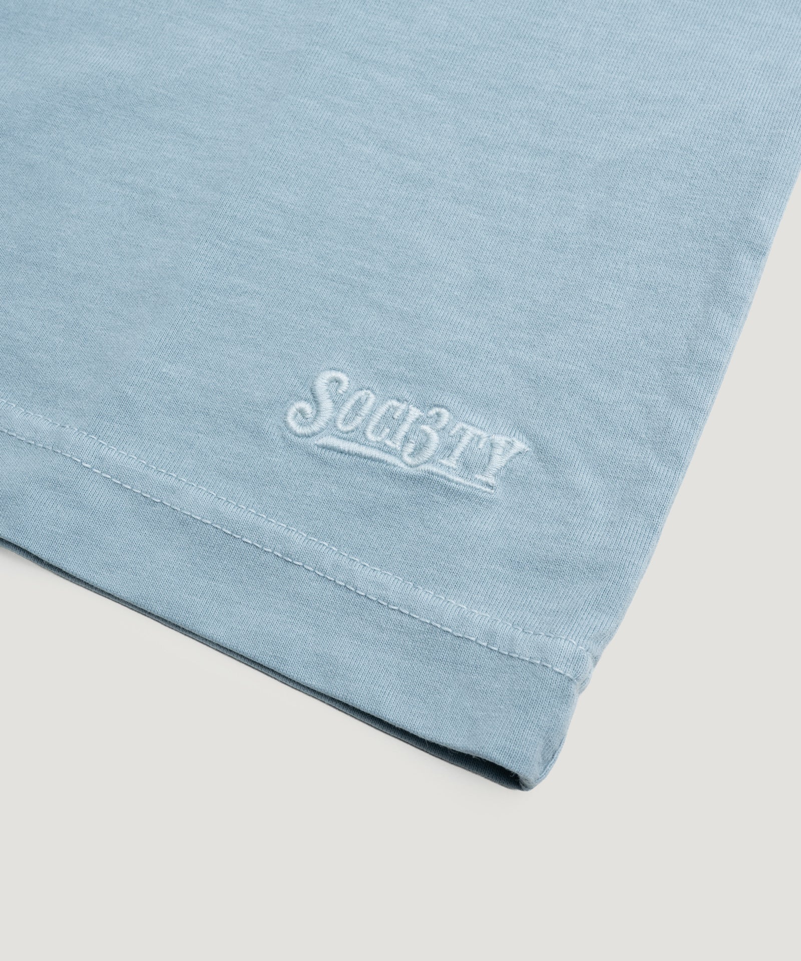 SOCI3TY Luxury Sportswear Jersey T-shirt garment - dyed katoen lichtblauw - THE SOCIETY SHOP
