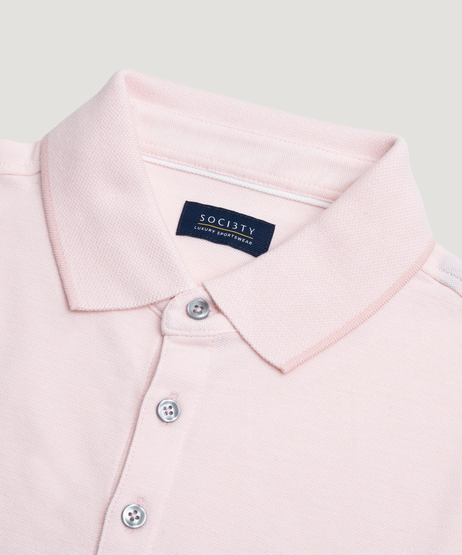 SOCI3TY Luxury Sportswear Polo piqué stretch lichtroze - THE SOCIETY SHOP